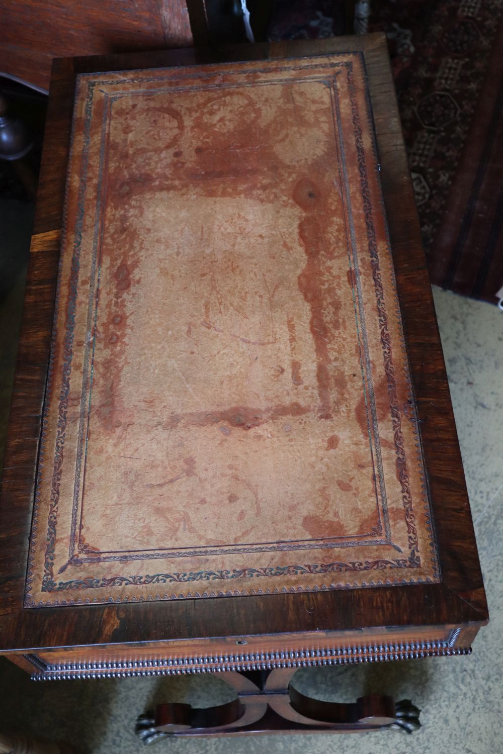 A Regency rosewood writing table, fitted end drawer, width 77cm depth 44cm height 73cm